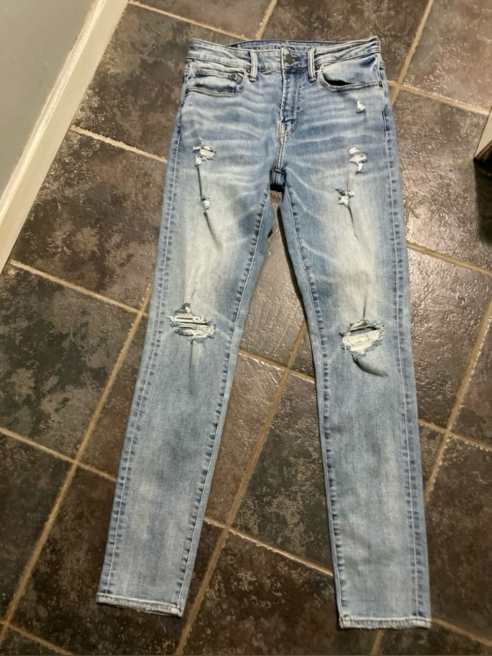 American Eagle Distressed Light Wash Jeans. Size 30" x36"
